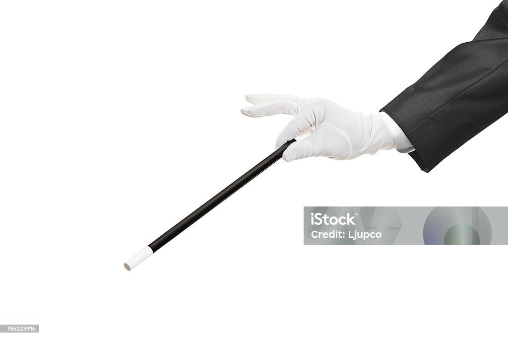 Hand holding a wand with a protective glove